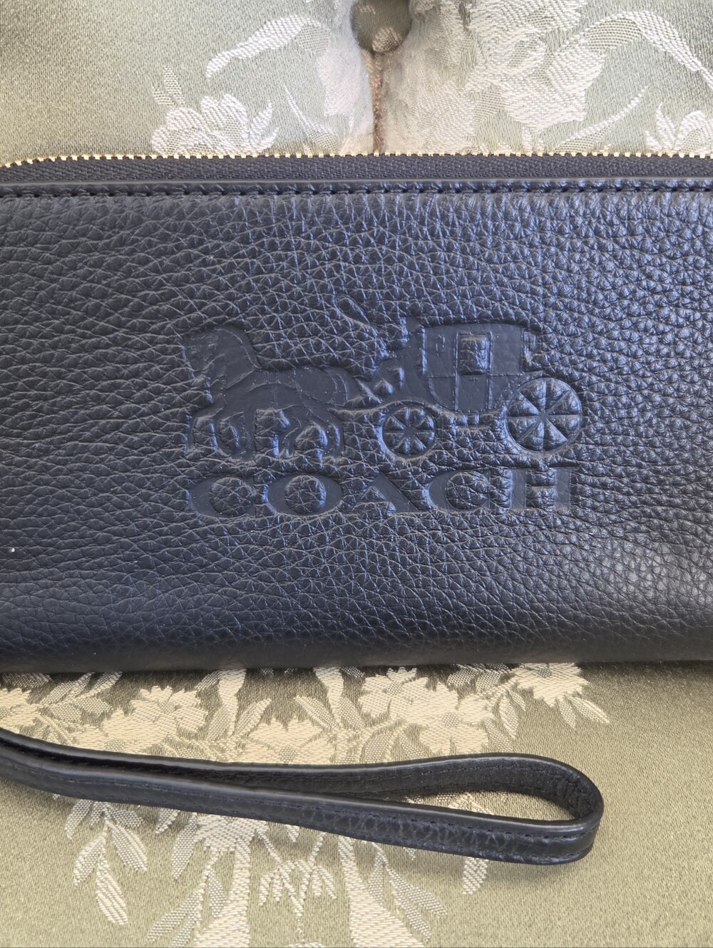 Coach Black Pebbled Leather Wristlet with Embossed Carriage
